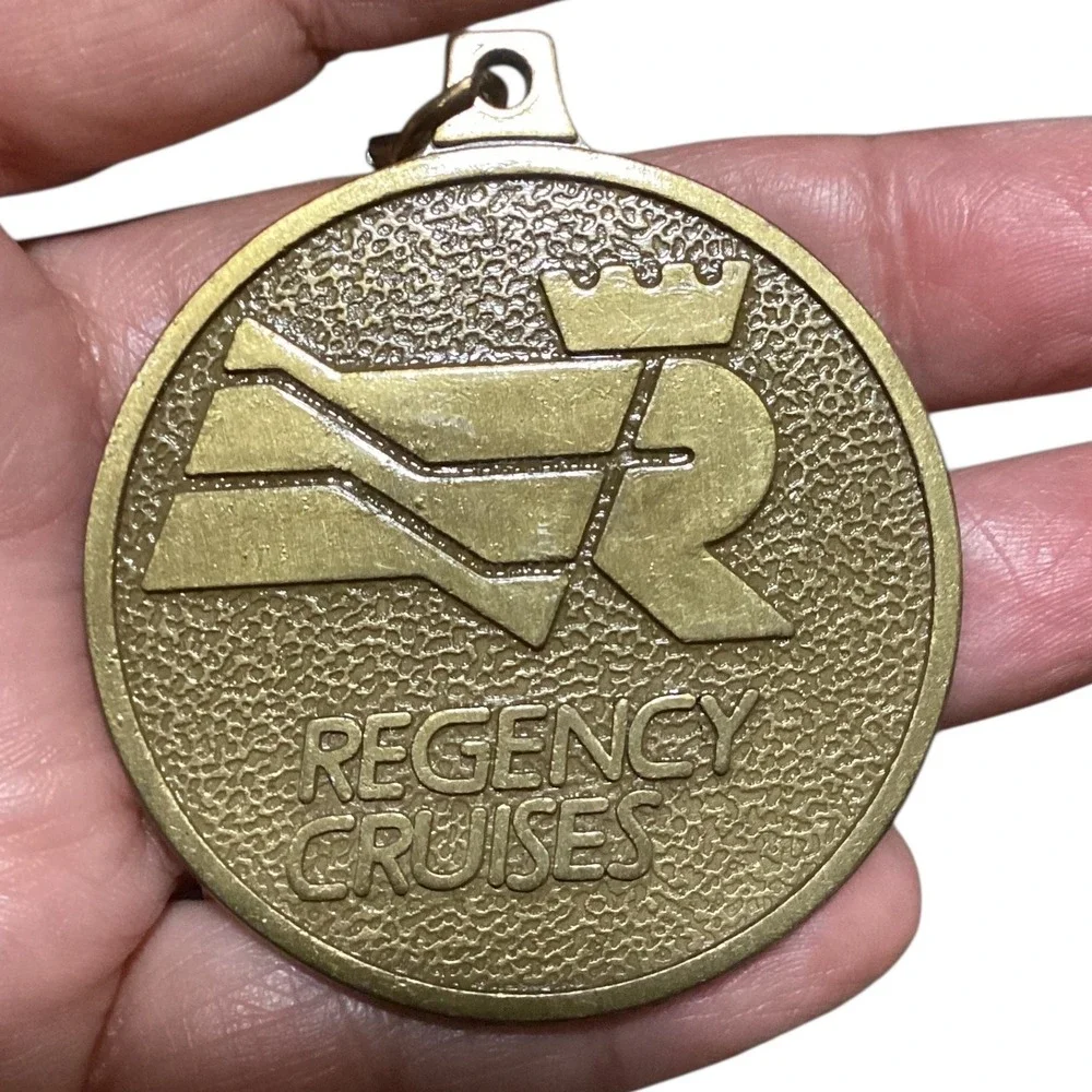 Regency Cruises Victory Medallion Souvenir Keychain Pendant Brass Tone USA